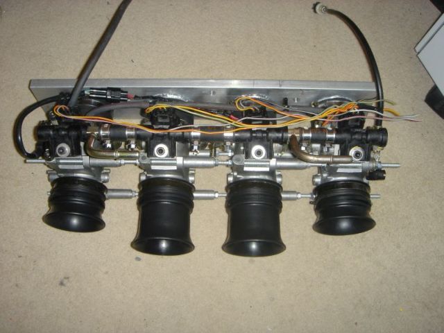 Bodies mounted to manifold